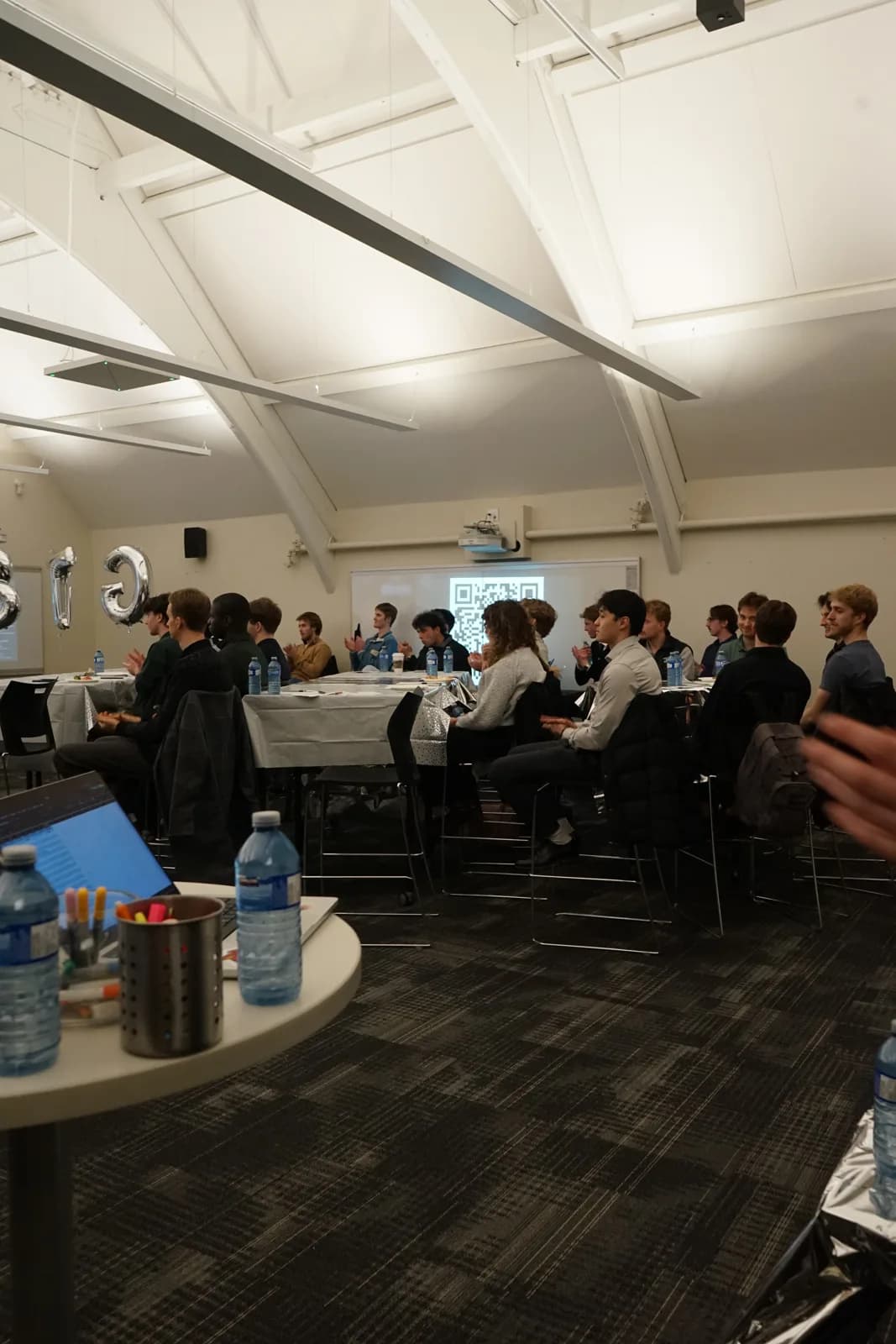 Students seated at tables during a BTG event